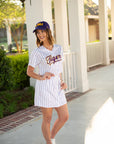 Woman in LSU jersey dress queen of sparkle outfit